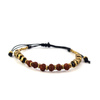 Bransoletka rudraksha, czarne koraliki i zlote elementy (na sznurku)